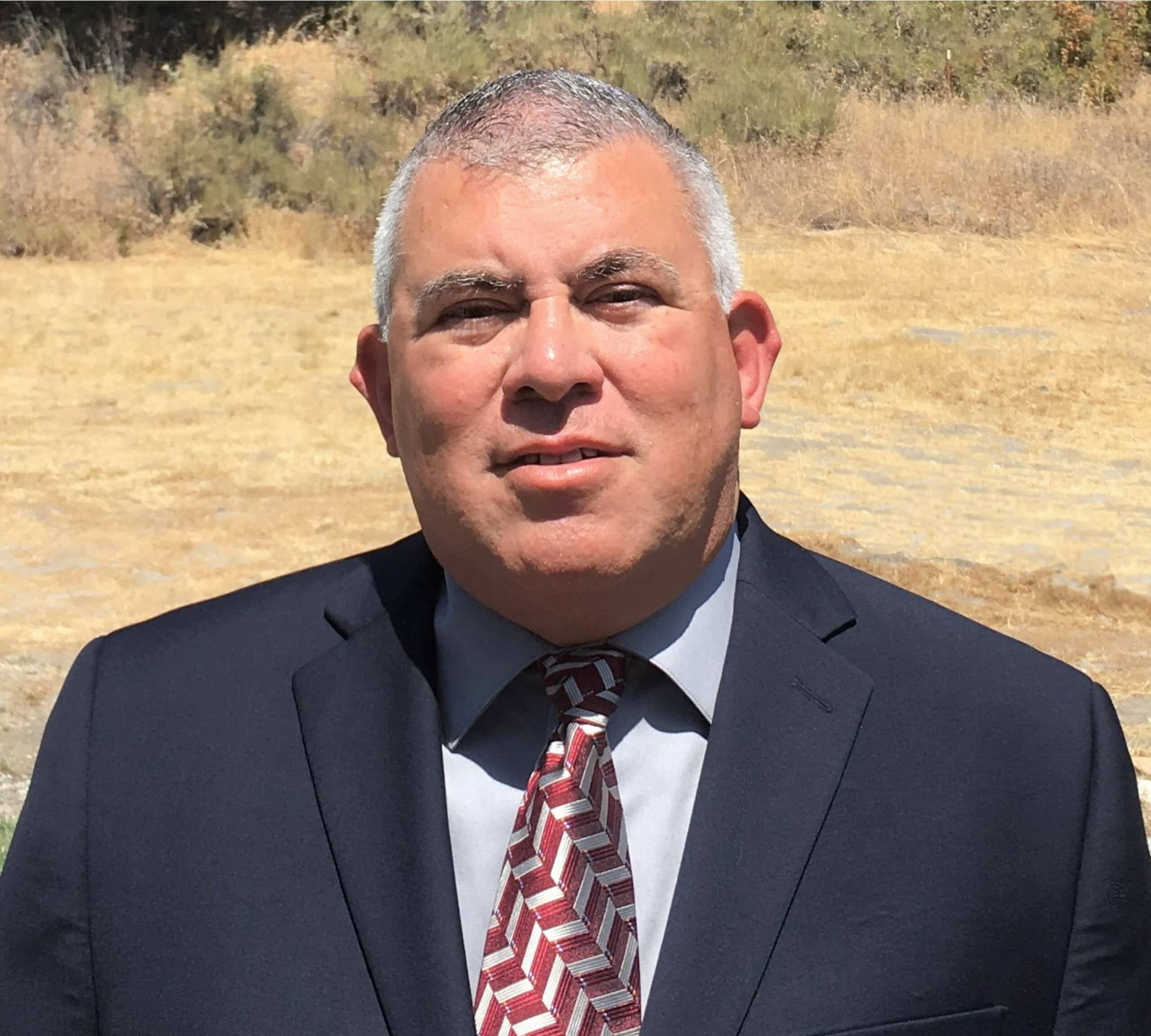 a man wearing a suit and tie