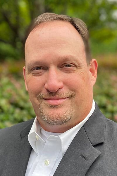 a man wearing a suit and tie