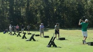 a group of people playing in a park