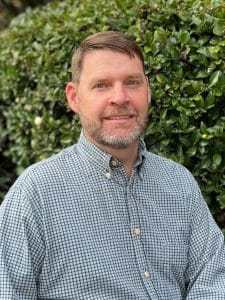 a man smiling for the camera