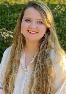 a person smiling for the camera