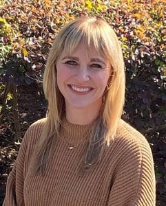 a woman smiling for the camera