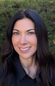 a woman smiling for the camera