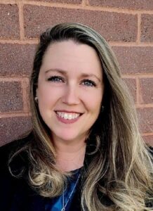 a woman smiling for the camera