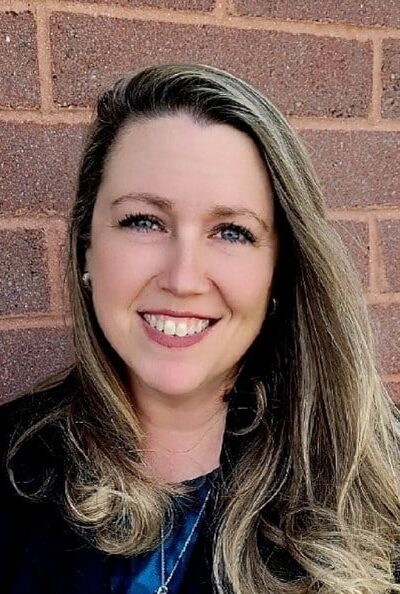 a woman smiling for the camera