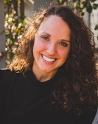 a woman smiling for the camera