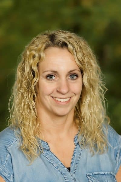 a woman smiling for the camera